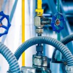 How can industrial valve manufacturers help businesses optimize their operations and reduce maintenance costs?